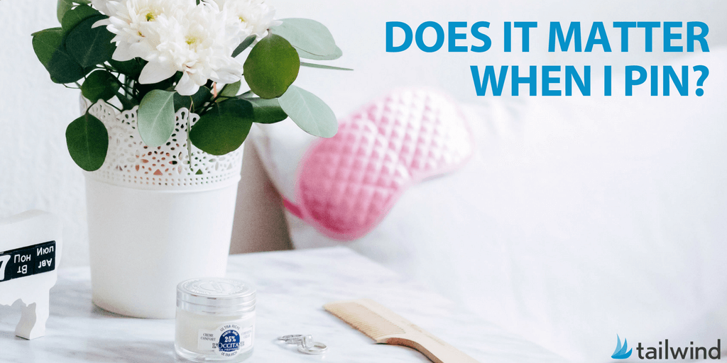 A white table with a potted plant, a comb, cream jar, and earrings. Text reads "DOES IT MATTER WHEN I PIN TO PINTEREST?" with the Tailwind logo in the bottom right corner.