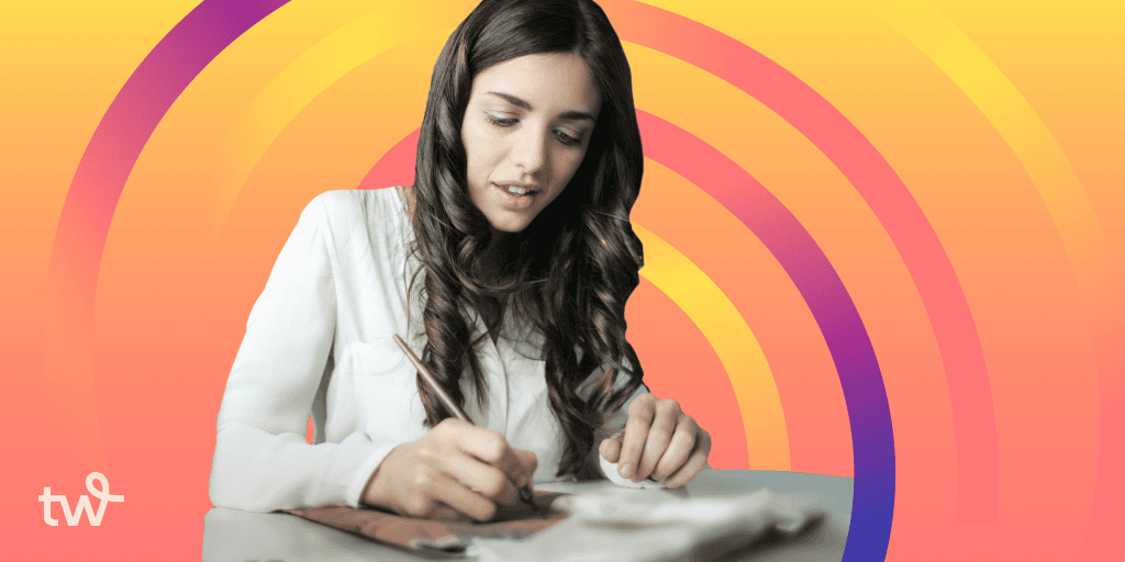 A woman with long brown hair sits at a table working on a craft project. The orange and yellow gradient background features colorful, curved stripes in yellow, orange, and purple tones. The Tailwind logo is in the corner.