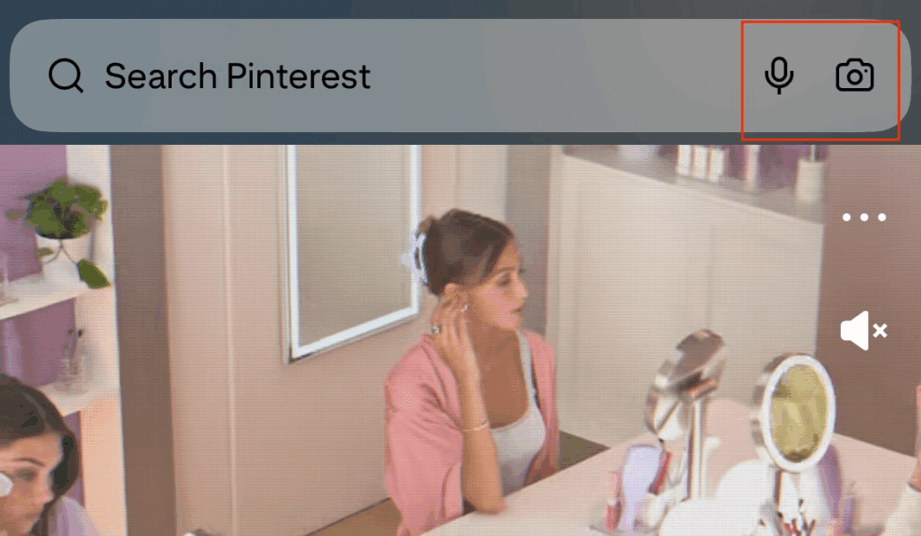 Screenshot from Pinterest Lens mode: shows a camera-view overlay with a circle in center targeting an object. Below the lens area are icons/buttons for actions (e.g. a flashlight toggle, lens search, camera shutter). At top is a search bar or indicator. The interface suggests the user is using visual search to identify or explore objects captured by the camera.